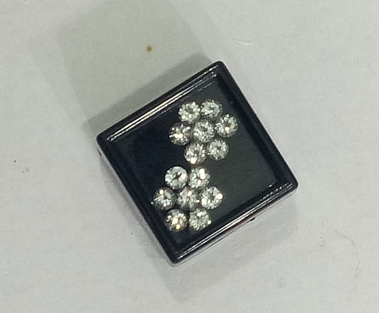 White Topaz, for ears studs.